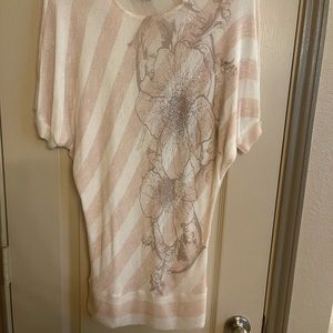 Pink and white stripped blouse.
